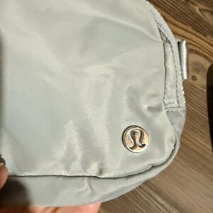 lululemon athletica Pale Gray Crossbody Bag with Silver Logo